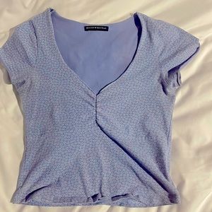 Brandy Melville gina top! Light blue with flowers. Very good condition.